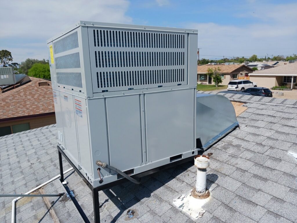 A newly installed rooftop HVAC unit by Service Experts Phoenix on a residential roof in Phoenix, AZ.