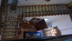 An elegant patterned carpet runner beautifully installed on a staircase by Ko-Z-Craft in Los Angeles, CA.