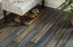 A room featuring newly installed wood-look flooring, a completed residential project by Anaheim Carpet and Flooring in Anaheim, CA.