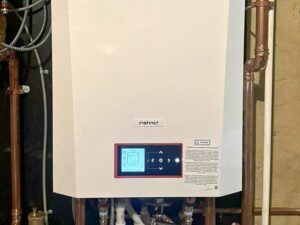 A modern Instinct boiler unit installed by QC Mechanical, Inc. in Lockport, NY.