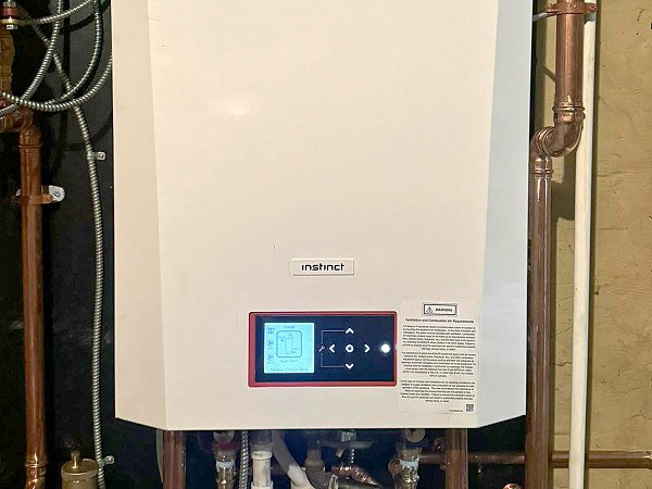 A modern Instinct boiler unit installed by QC Mechanical, Inc. in Lockport, NY.
