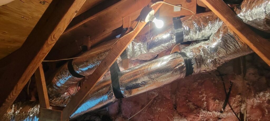 Insulated HVAC ductwork installed in an attic space by Hodges Heating & Cooling in Owensboro, KY.