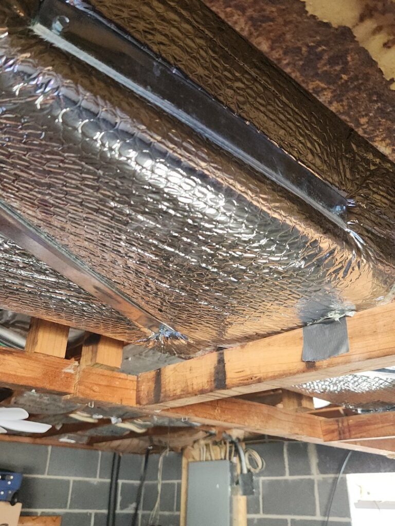 Insulated ductwork installed in a ceiling by Kanawha Valley Maintenance in Charleston, WV