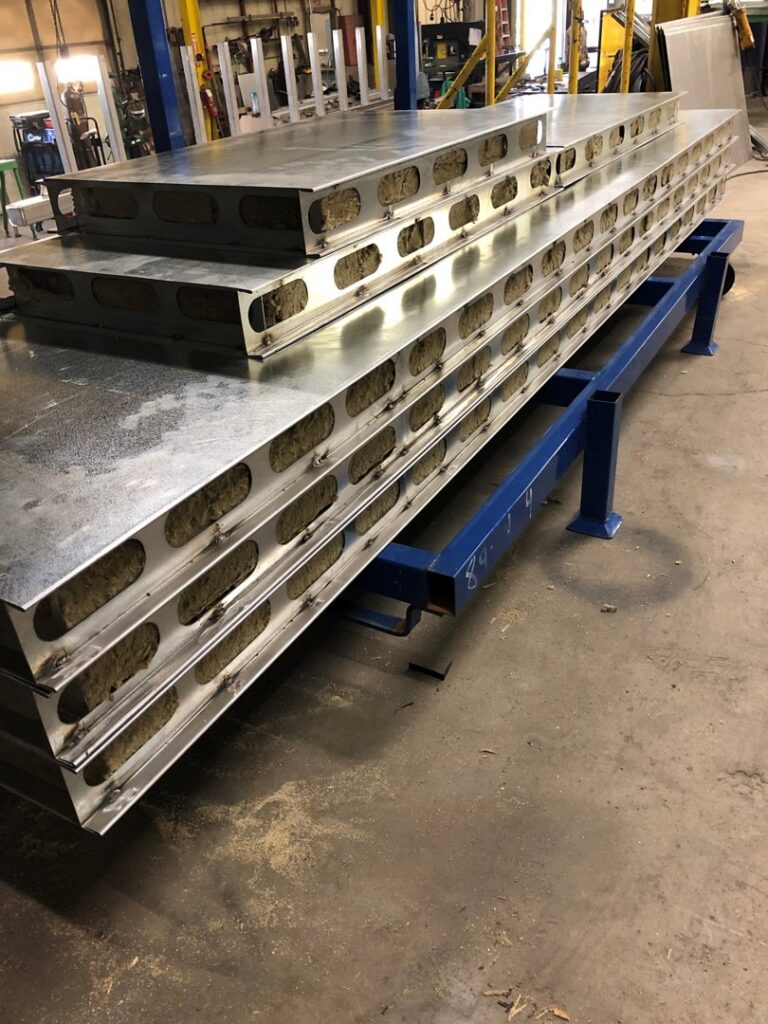 Stacked insulated metal panels, likely for HVAC ductwork or air handling units, at Central Consolidated in Wichita, KS