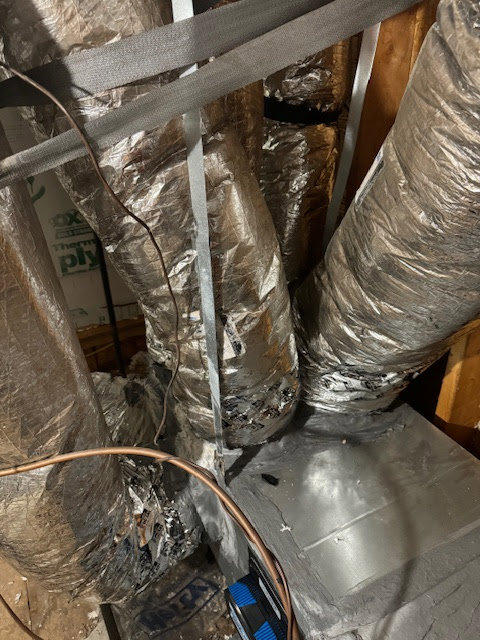 Insulated HVAC ductwork visible in an attic, installed by EZ Comfort Air Conditioning & Heating LLC in Humble, TX.