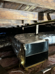 Insulated HVAC ductwork running through an attic space, installed by Fast Air in Zebulon, NC.