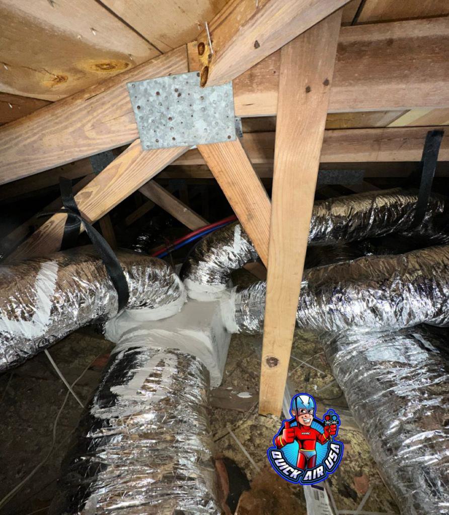 Newly installed insulated HVAC ductwork in an attic by QUICK AIR USA in Orlando, FL.