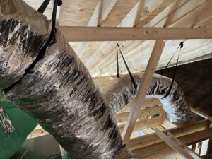 Newly installed insulated HVAC ductwork in an attic by KMC Heating and Cooling LLC in Clarksville, TN.