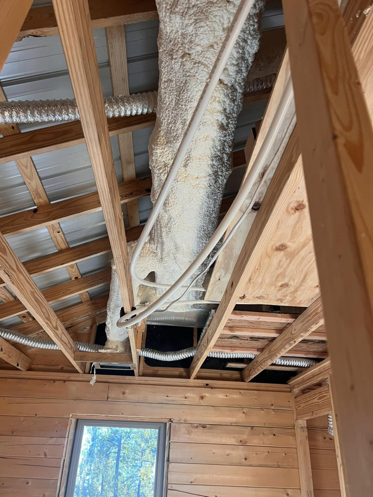 Insulated HVAC ductwork installation in a ceiling during construction by Smartcool Inc. in Pine Bluff, AR.