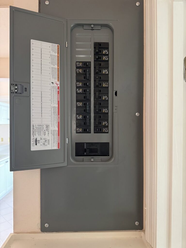 An interior electrical panel with circuit breakers serviced by Dynamic Electric in Cape Coral, FL.