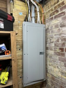 An interior electrical breaker panel with organized wiring, installed by Shocking Solutions in Knoxville, TN.