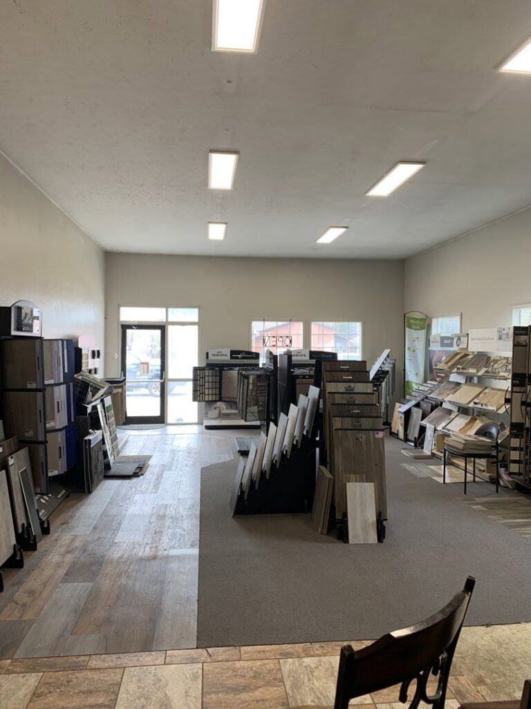 An interior shot of the Hale Flooring LLC store, showcasing a wide selection of carpet samples and other flooring options in Kamiah, ID.