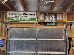 Interior view of a garage door showing springs and tracks, installed by Platinum Garage Door Services in Helena, AL