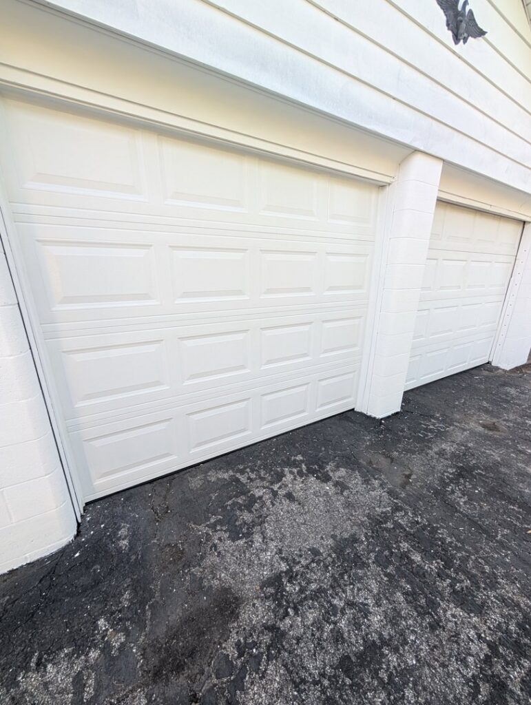 Interior view of a white garage door with windows, showcasing the installation by Precision Garage Door of Owensboro Evansville in Owensboro, KY.