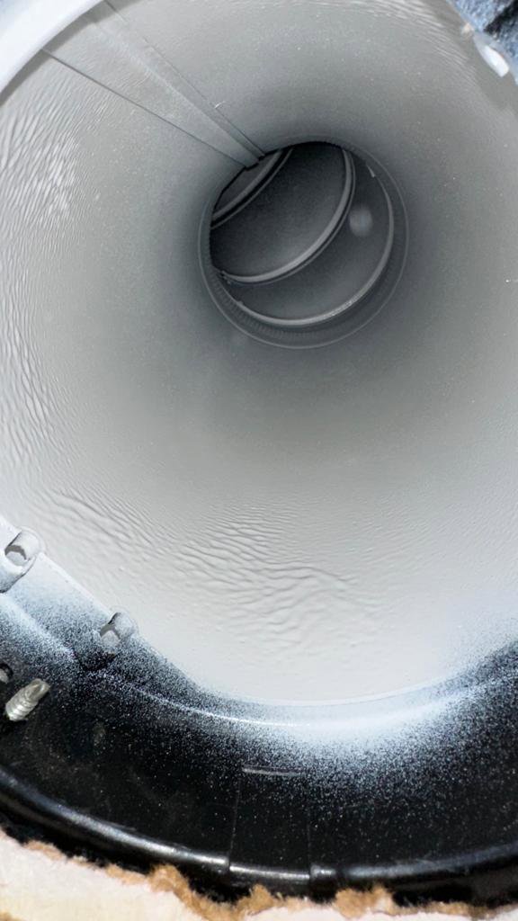 Interior view of a clean, round air duct serviced by Delta Clean Air in Boston, MA