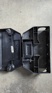 The interior view of a pest control bait station ready for deployment by Armstrong's Wildlife Solutions in Rochester, NY.