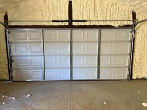 Interior view of a newly installed insulated garage door by Anew Garage by Jon's Garages in Surprise, AZ.