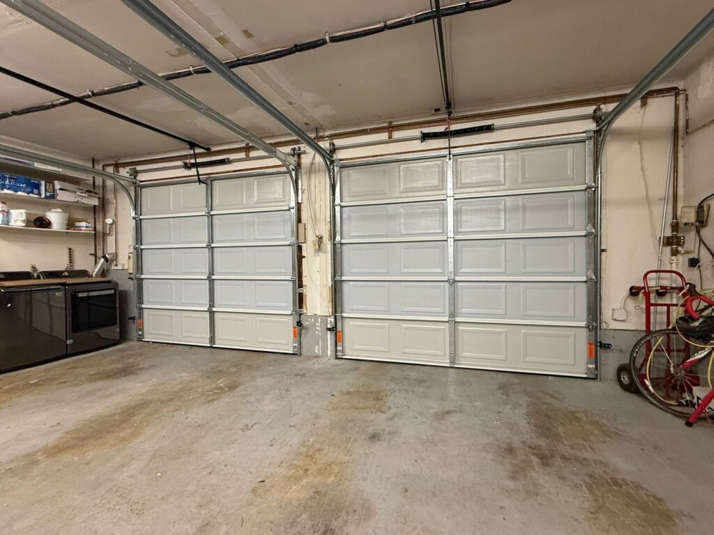 Interior view of two newly installed garage doors by AAA Garage Door Services in Renton, WA