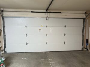 Interior view of a white garage door installed by Smokey's Garage Door Company in Glendale, AZ.