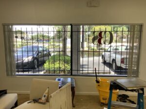 Interior view of windows with black security bars installed by Ability Burglar Bars in Jacksonville, FL.