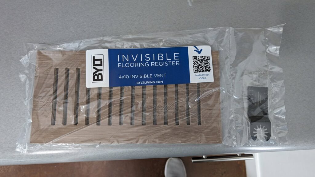 An 'Invisible Flooring Register' kit with an installation tool from BYLT Living in Sandy, UT