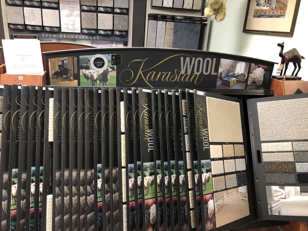 A display of Karastan wool carpet samples in the showroom at Rug Masters in Charleston, SC.