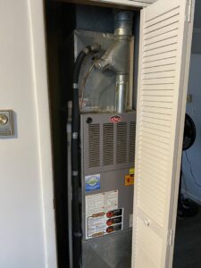 A King furnace and air handler unit with ductwork installed by Riccardi Heating and Air in Toms River, NJ.