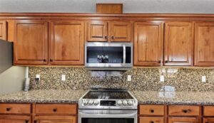 Kitchen with installed microwave, stove, and electrical outlets by Lindsey and Son Electric, LLC in Summerville, SC