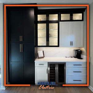 Custom kitchen and bar area featuring under-cabinet lighting and electrical outlets by Koehler Electric in Davenport, IA.