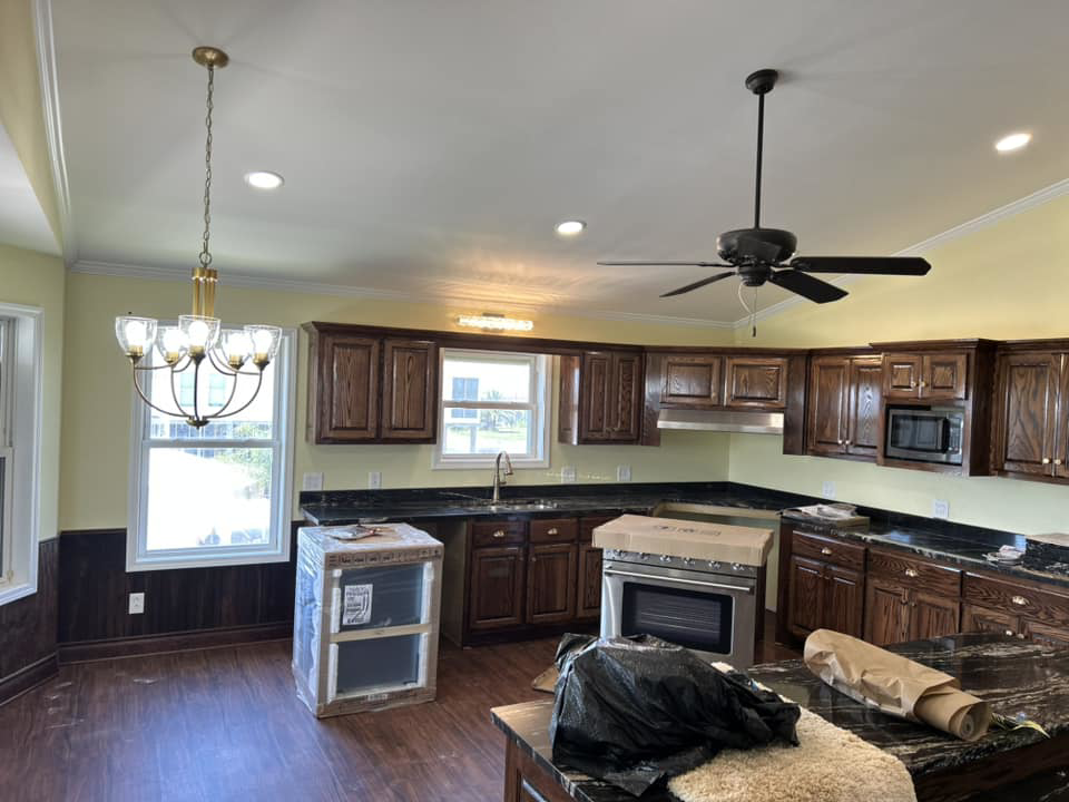 A stylish ceiling fan installed in a kitchen by S&S A/C and Electrical LLC in Houma, LA.