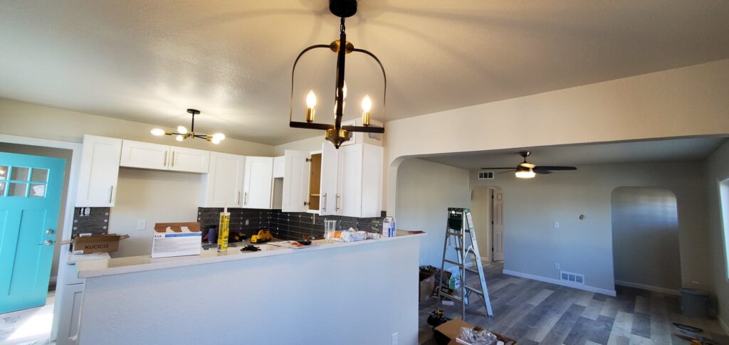 New kitchen and dining area lighting fixtures installed by Midway Electric Inc. in Columbia, MO.