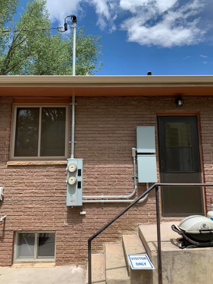 Newly installed electrical outlets above a kitchen countertop, completed by AMG Electric LLC Laramie, WY.