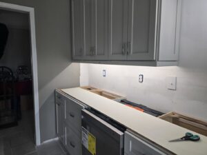 Kitchen electrical renovation showing under-cabinet lighting, outlets, and switches by Heck Electric, LLC in Everett, WA