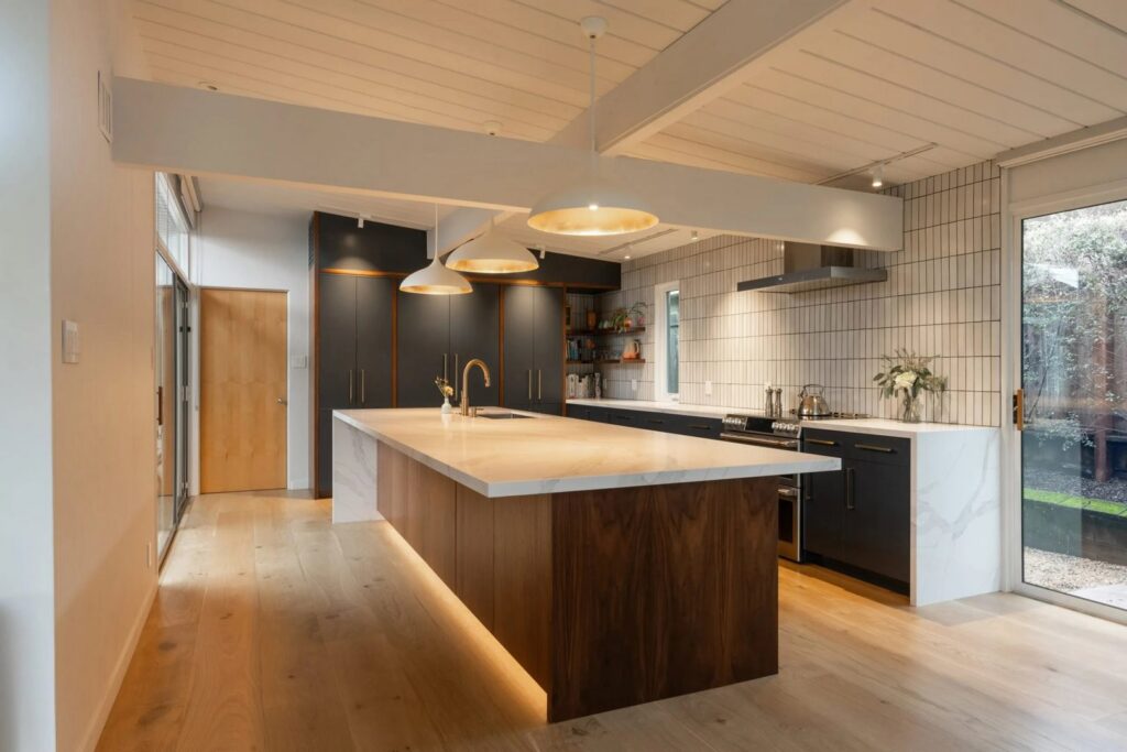 Kitchen with island pendant lights, recessed lighting, and under-cabinet lighting installed by R.C Electric, Inc. in San Francisco, CA