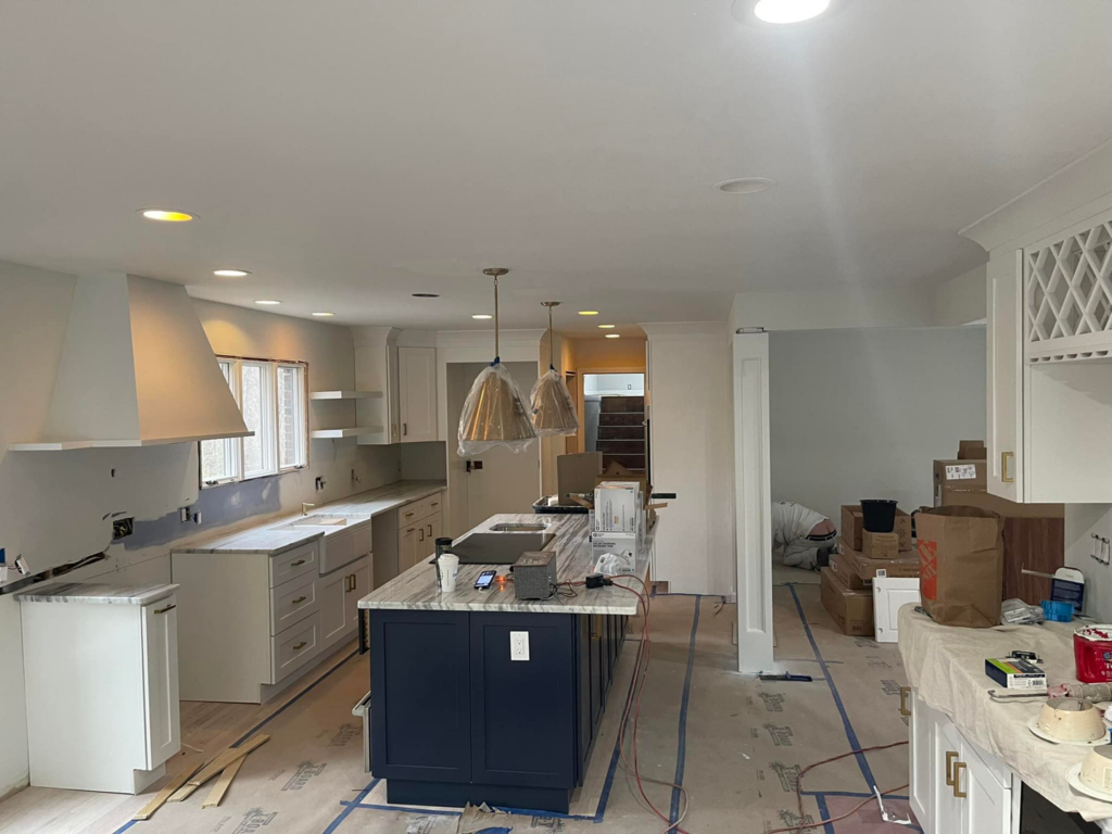 Kitchen lighting installation during a renovation by A.C. & Son's Electric LLC in Pawtucket, RI