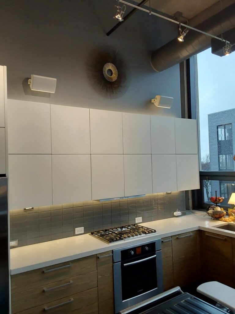 Under-cabinet, recessed, and track lighting installed in a modern kitchen by Flavin Electric, LLC in Chicago, IL