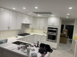 Kitchen under construction with recessed and under-cabinet lighting being installed by Gilmore Electrical in Saint Louis, MO