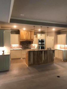 Modern kitchen with recessed, pendant, and under-cabinet lighting installed by JMD Electric, LLC in O'Fallon, MO.