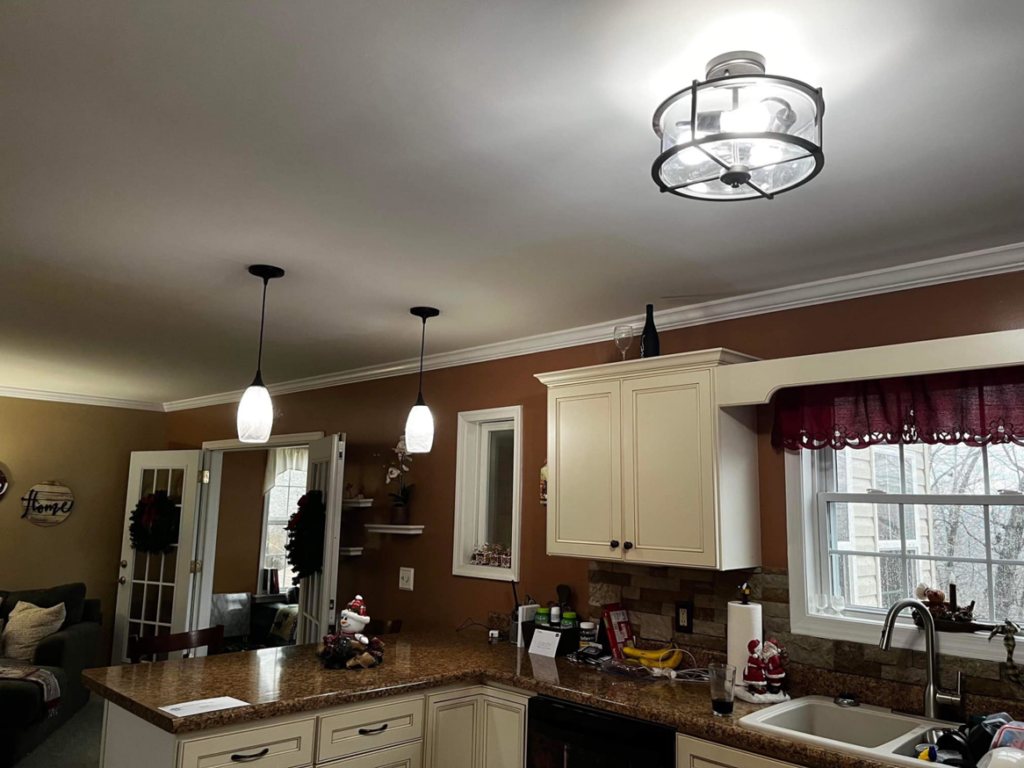 New kitchen light fixtures, including pendant lights and a ceiling light, installed by SandD electric in Winchester, VA.