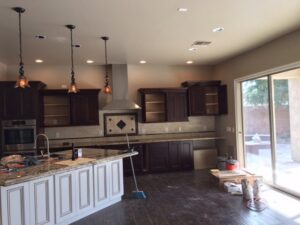 Kitchen under construction with new pendant and recessed lighting installed by Turn It On Electric in Phoenix, AZ