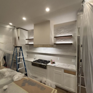Kitchen lighting installation in progress by Wilson Electrical Contractors in Orlando, FL, showing recessed and under-cabinet lights.