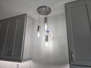Stylish pendant lighting installed above a kitchen counter by Heck Electric, LLC in Everett, WA