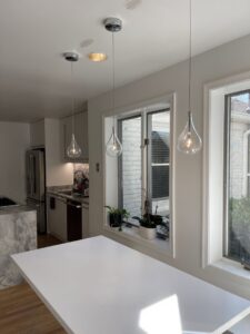 Kitchen with new pendant and recessed lighting installed by Armenergo Electrician in Rockville, MD