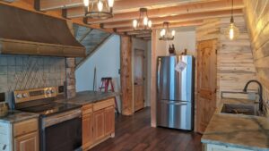 Modern kitchen featuring stylish pendant and recessed lighting installed by BlackRock Electrical in Pocatello, ID.