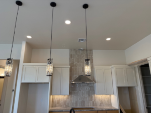 Professional installation of kitchen pendant and recessed lighting by O'Dell Electrical Services in Albuquerque, NM.