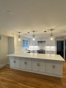 Newly installed kitchen pendant and recessed lighting by Ramos Electrical services inc in Brownsville, TX