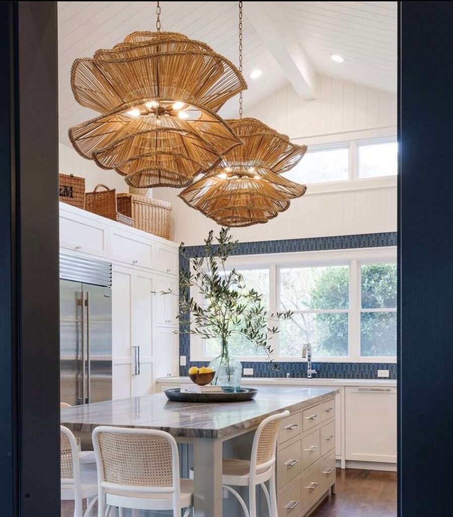 Kitchen showcasing large decorative pendant lights and recessed lighting installed by R.C Electric, Inc. in San Francisco, CA