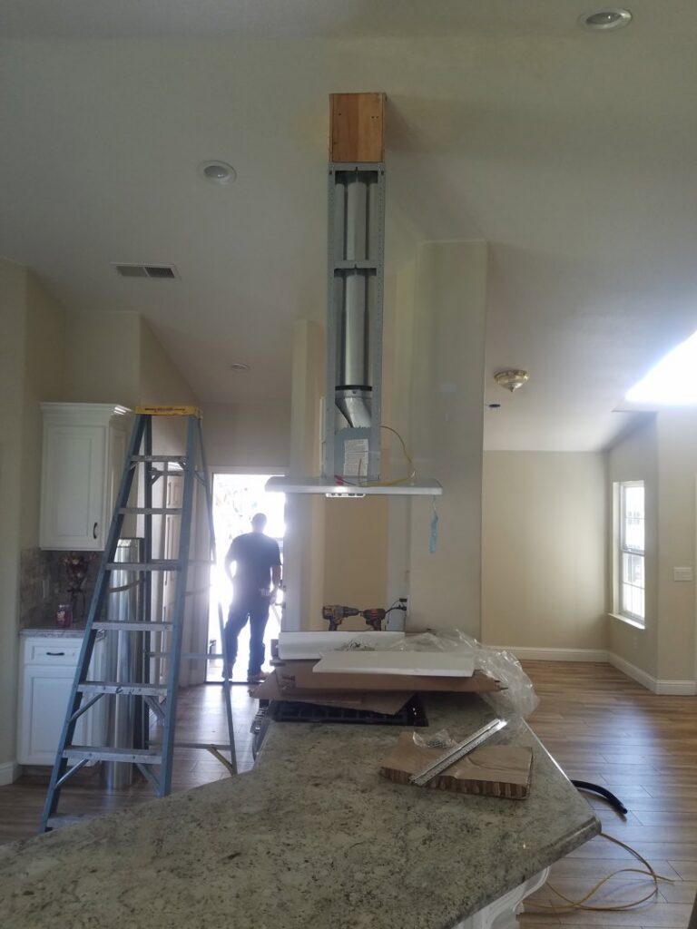 Installation of a kitchen range hood and ductwork, part of HVAC services by All Pro Air in Warrenville, IL.