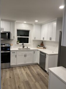 A modern kitchen featuring new recessed lighting installed by Good Contact Electric, LLC in Tacoma, WA.