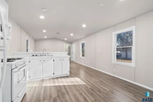 Kitchen with new recessed lighting installed by Green Monarch Construction in Sioux Falls, SD